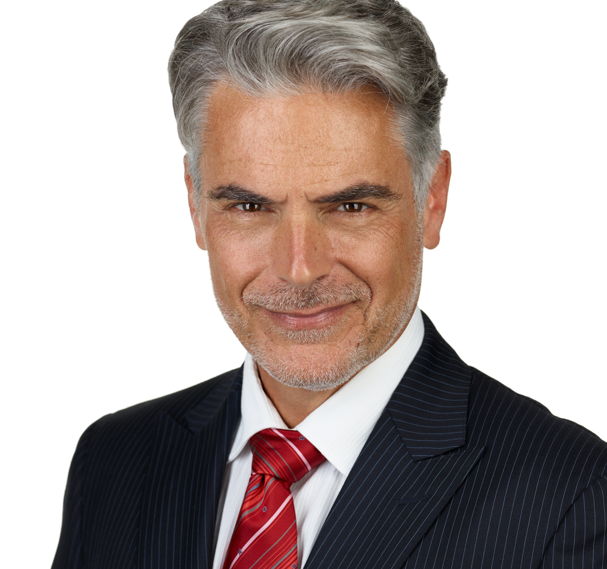 Professional headshot of a male corporate businessman in a suit and tie taken at NYC Headshot.